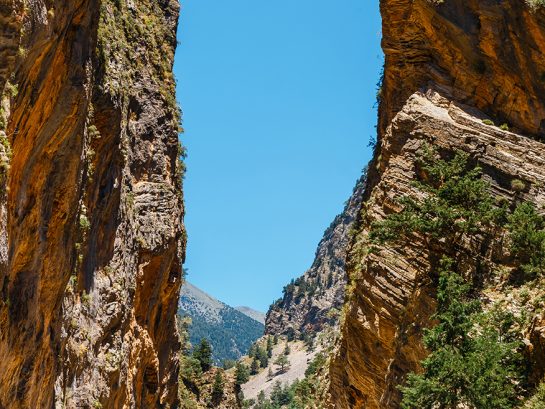 Crete, Greece, May 26, 2016: Tourists hike in Samaria Gorge in c Crete, Greece, May 26, 2016: Tourists hike in Samaria Gorge in central Crete, Greece. The national park is a UNESCO Biosphere Reserve since 1981